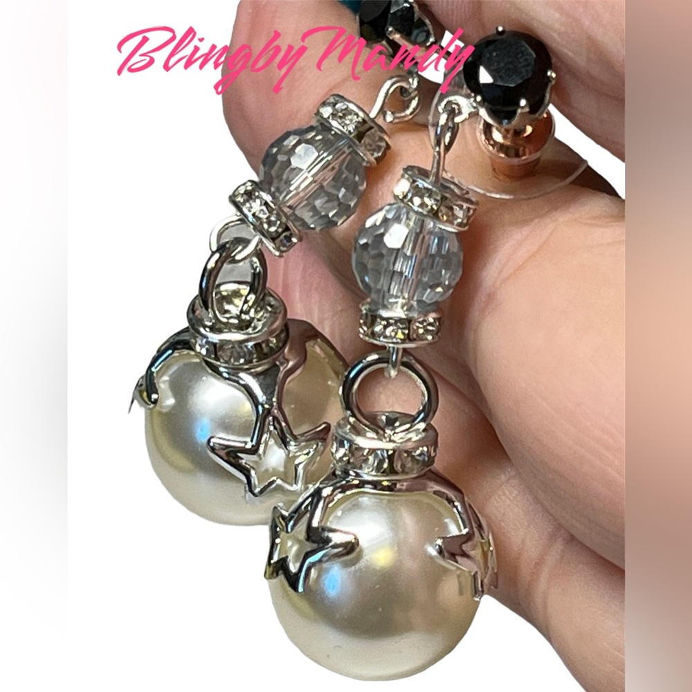 Faux pearl earrings with rhinestone and silver accent-stars